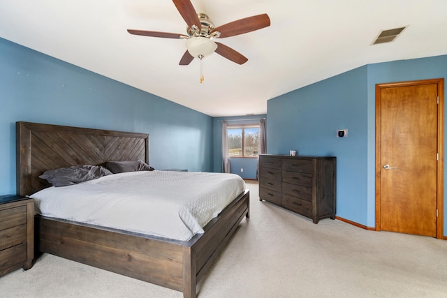 bedroom featuring ceiling fan and light colored carpet