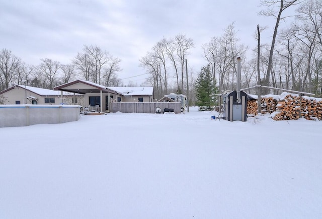 view of yard covered in snow