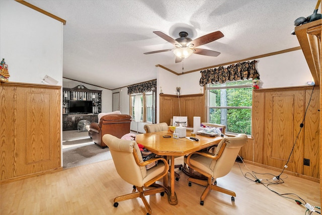 4348 S Grandview Hwy, Harrietta, MI 49638 - dining area featuring crown molding, light hardwood / wood-style floors, and a textured ceiling