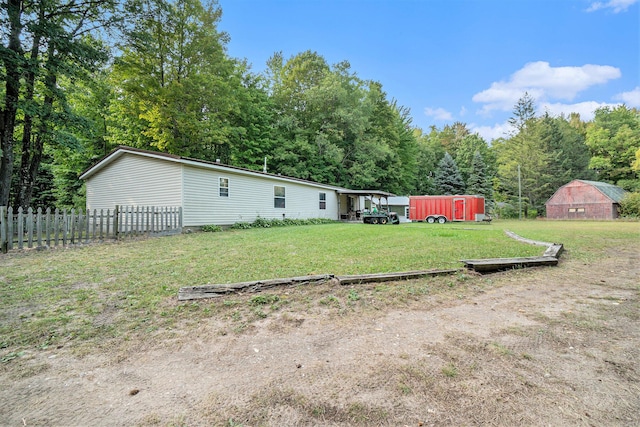 4348 S Grandview Hwy, Harrietta, MI 49638 - view of yard featuring an outbuilding