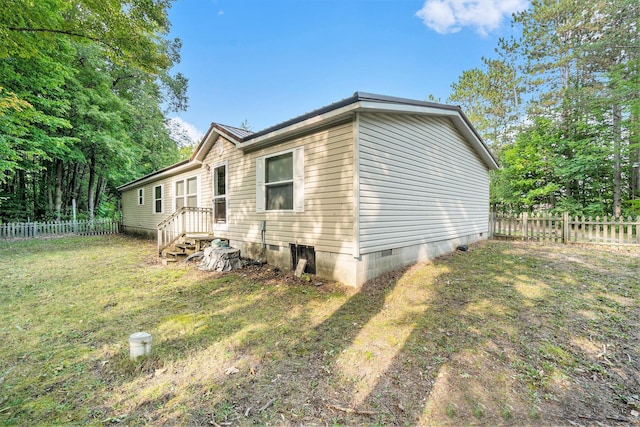 4348 S Grandview Hwy, Harrietta, MI 49638 - view of home's exterior with a lawn