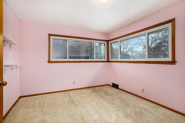 view of carpeted spare room