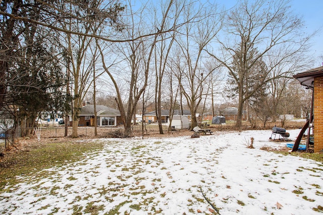 view of snowy yard