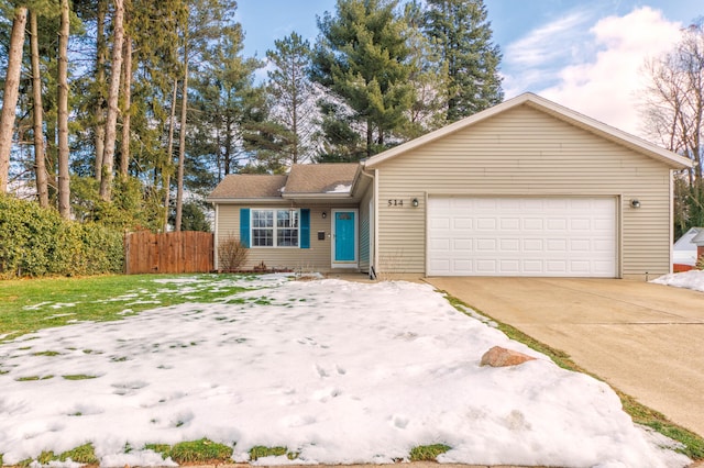 single story home featuring a garage