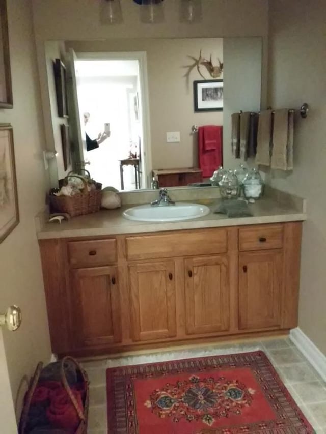 bathroom featuring vanity and tile patterned floors