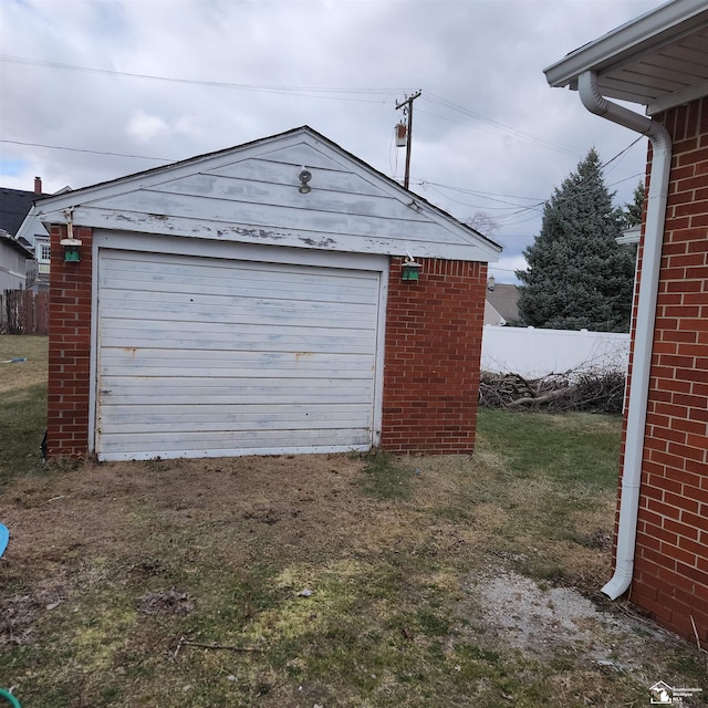 garage with a yard