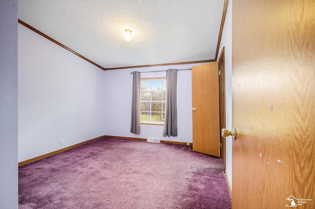 unfurnished bedroom featuring crown molding, carpet flooring, and a textured ceiling