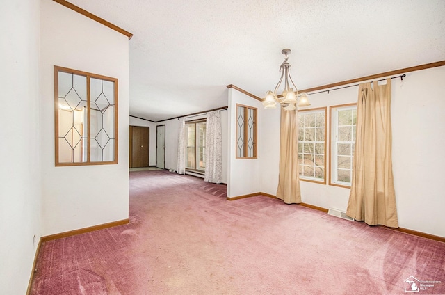 carpeted empty room with a notable chandelier, crown molding, and a textured ceiling