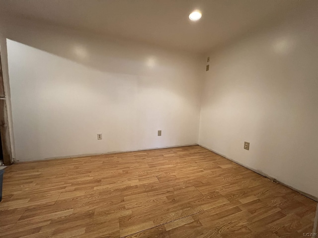 unfurnished room featuring light hardwood / wood-style flooring