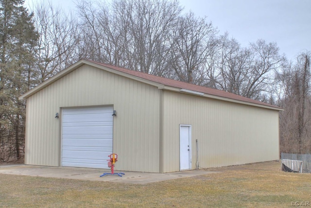 garage featuring a yard