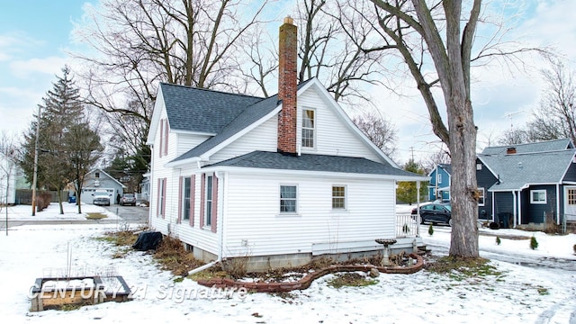 view of snow covered property