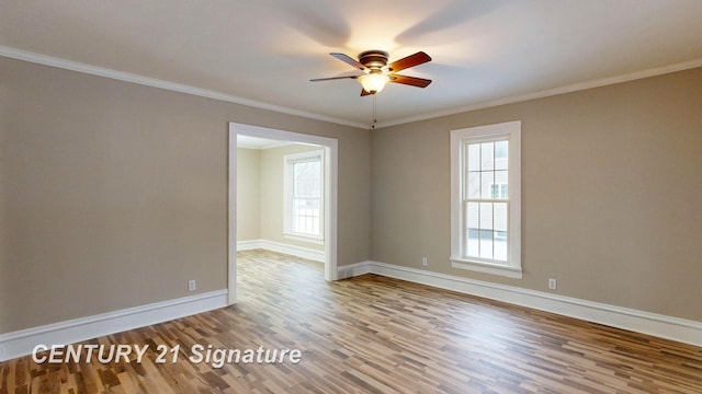 unfurnished room featuring crown molding, wood-type flooring, and ceiling fan