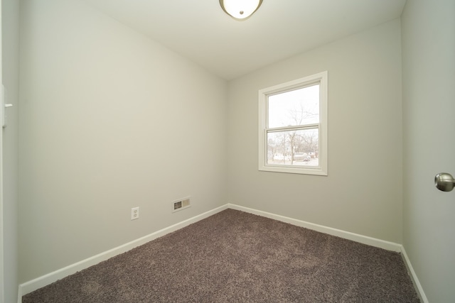 empty room featuring carpet