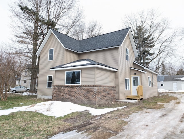 view of snow covered property