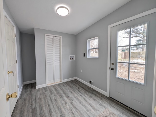 doorway with light hardwood / wood-style floors