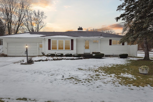 single story home with a garage