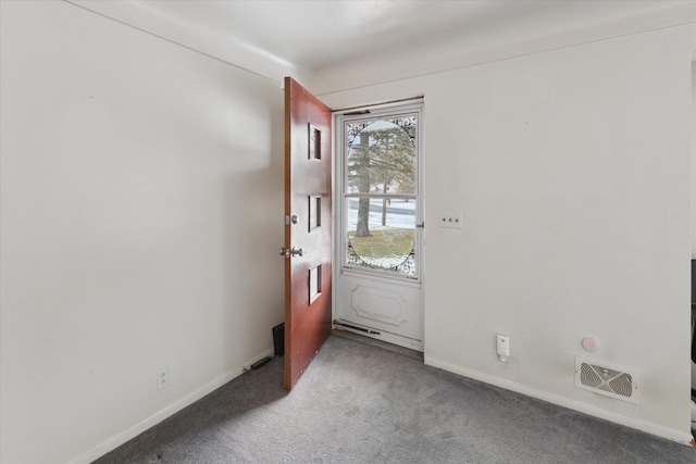 view of carpeted foyer