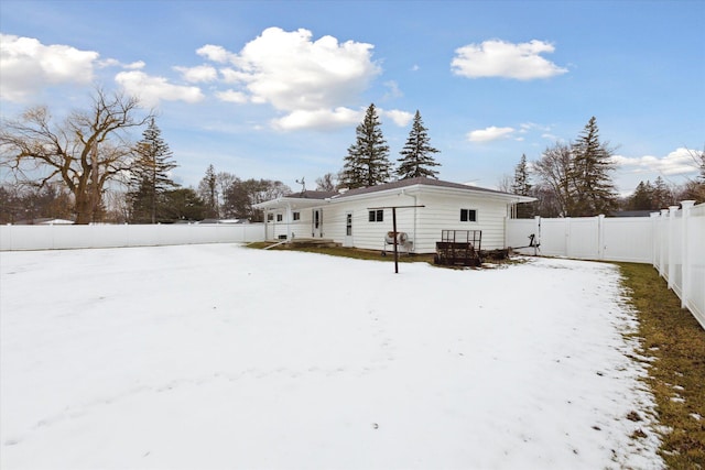 view of snow covered house