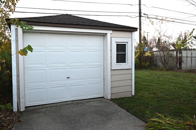 garage with a yard