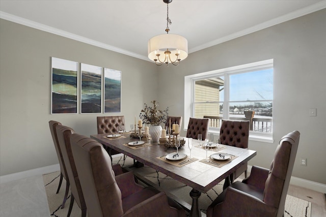 carpeted dining space with a notable chandelier and ornamental molding