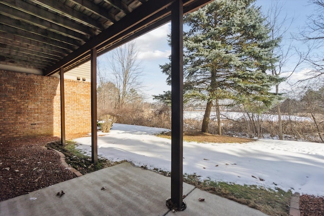 view of snow covered patio