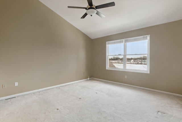 unfurnished room featuring lofted ceiling, light carpet, and ceiling fan