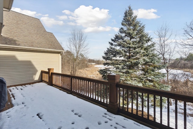 view of snow covered deck