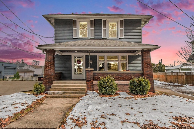 view of front property featuring a porch