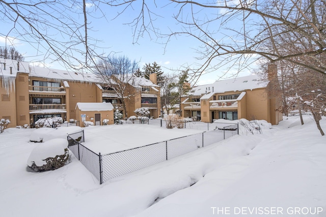 view of yard layered in snow