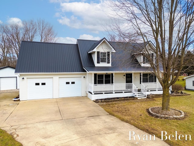 cape cod home featuring a porch and a front yard