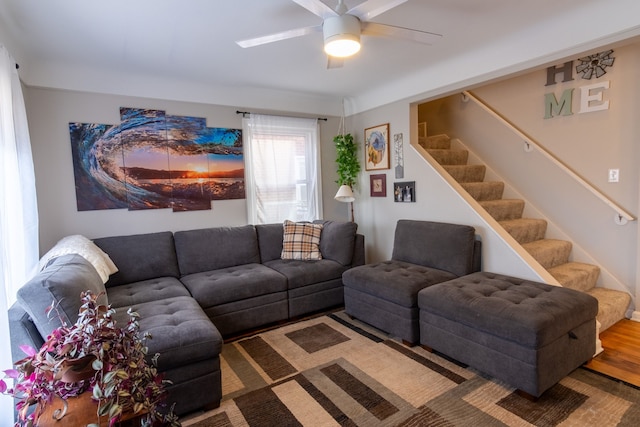 living room featuring ceiling fan and wood-type flooring