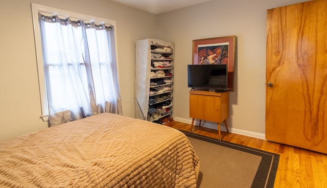 bedroom featuring hardwood / wood-style floors