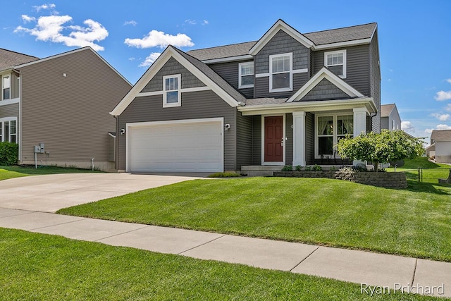 craftsman-style house with a garage and a front lawn