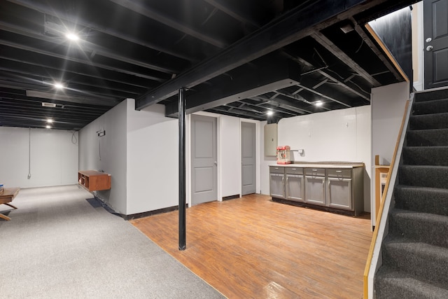 basement featuring light hardwood / wood-style flooring