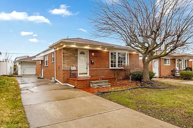 view of front of house with a garage and a front yard