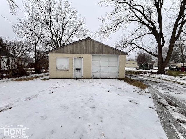 view of snow covered garage