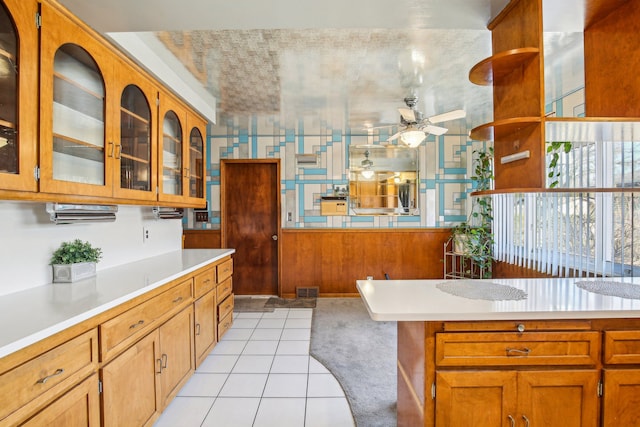 kitchen with ceiling fan and light tile patterned floors