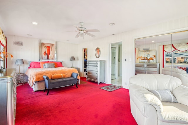 bedroom featuring ceiling fan, carpet flooring, and a closet