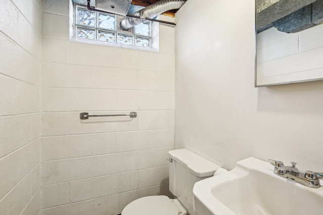 bathroom with sink and toilet