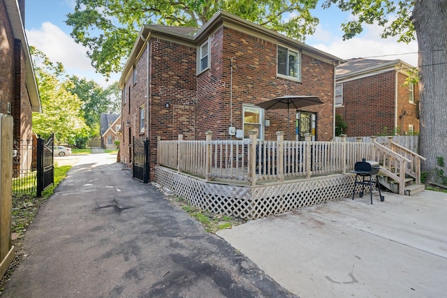 exterior space featuring a wooden deck