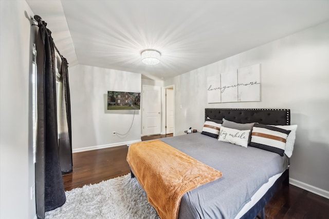 bedroom featuring dark wood-type flooring