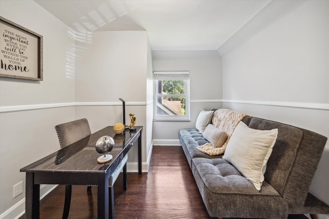 home office with dark hardwood / wood-style floors