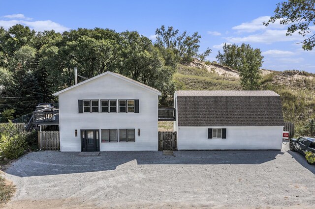 front of property with a wooden deck