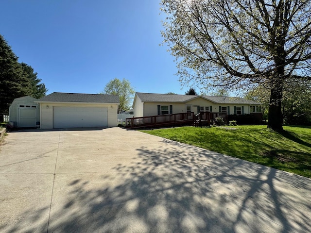 281 Mirror Dr, Jerome, MI 49249 - ranch-style house with a front lawn, a deck, a detached garage, and an outdoor structure