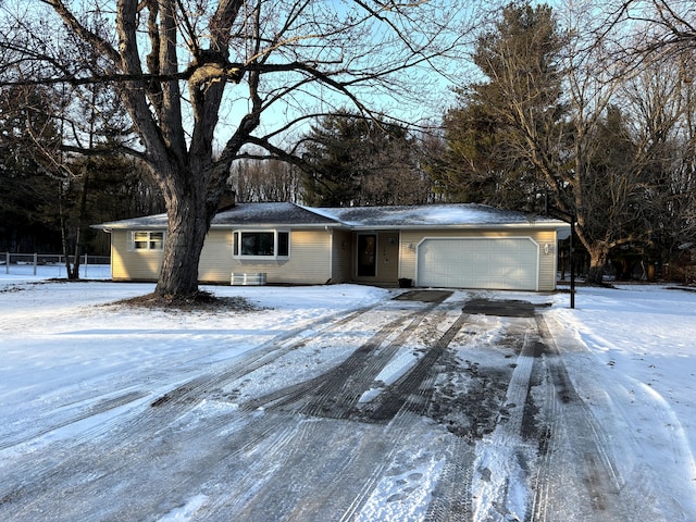 ranch-style home with a garage