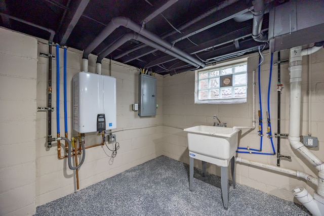 basement with sink, electric panel, and water heater