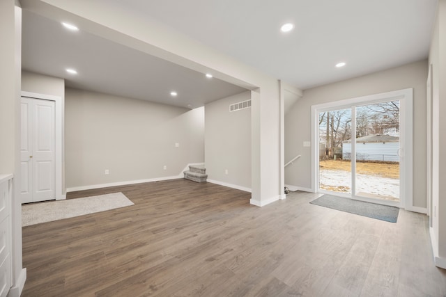 interior space with hardwood / wood-style flooring