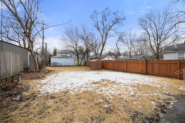 view of yard covered in snow