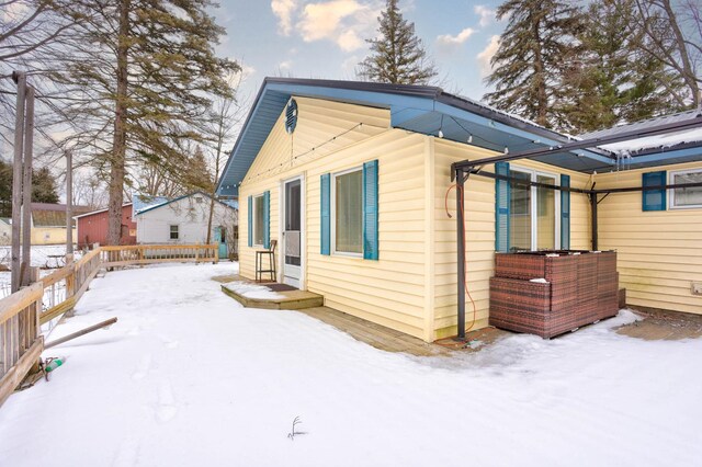 view of snow covered property