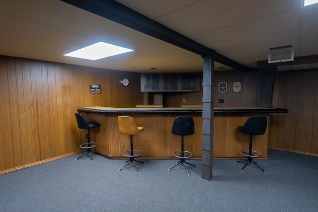 bar with wooden walls and carpet